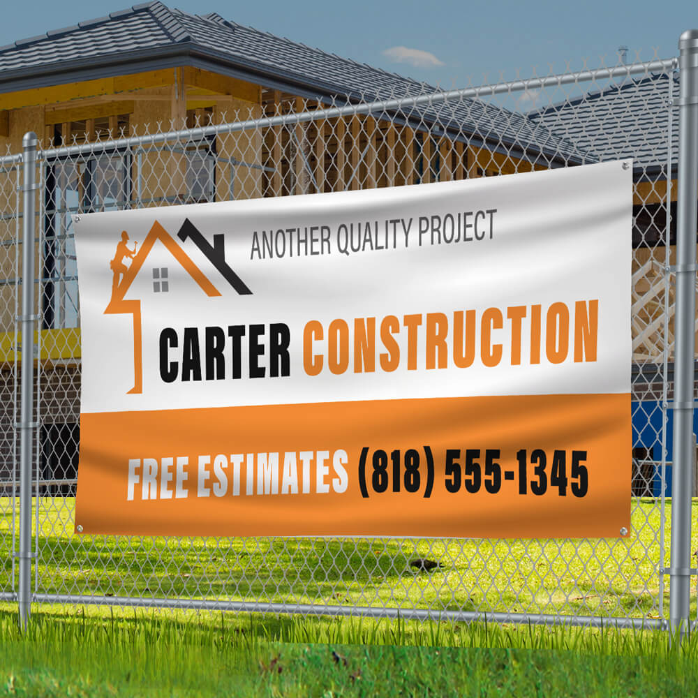 A construction banner for Carter Construction, featuring contact details for free estimates, in front of an unfinished building.